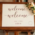 Beautiful wedding welcome sign with floral decorations and elegant calligraphy, perfect for greeting guests at a ceremony entrance, emphasizing the wedding welcome sign keyword.