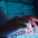 Person humanizing AI text on computer screen to ensure natural writing and high authenticity